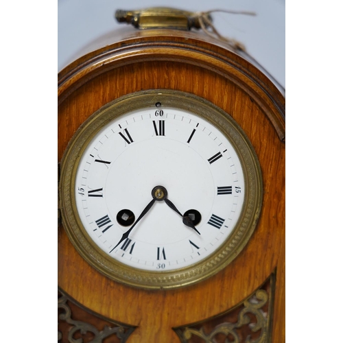 307 - A 19th century mahogany eight day mantel clock with enamel dial and pendulum, 30cm high. Condition -... 