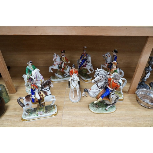 312 - A group of eight Italian porcelain figures on horseback, tallest 30cm. Condition - fair