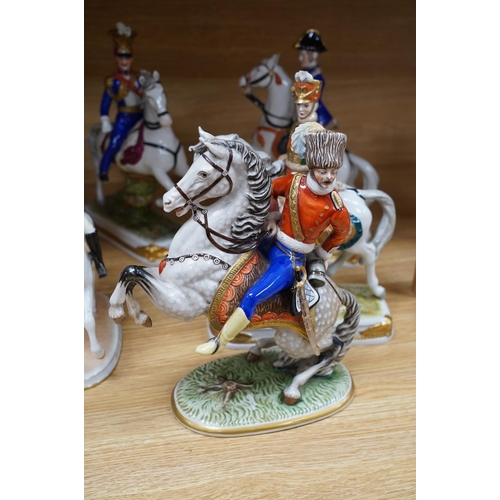 312 - A group of eight Italian porcelain figures on horseback, tallest 30cm. Condition - fair