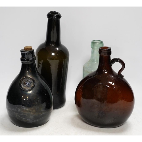 313 - A Georgian wine bottle and three others including one bearing label reading J.G. MONNET & Co. COGNA... 