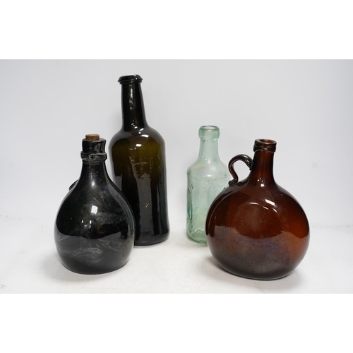 313 - A Georgian wine bottle and three others including one bearing label reading J.G. MONNET & Co. COGNA... 