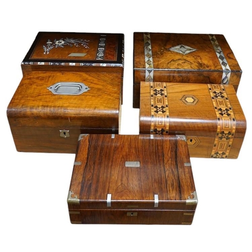 319 - A rosewood military box, a mother-of-pearl inlaid box, another similar box, an inlaid box and plaine... 