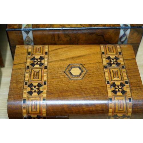 319 - A rosewood military box, a mother-of-pearl inlaid box, another similar box, an inlaid box and plaine... 