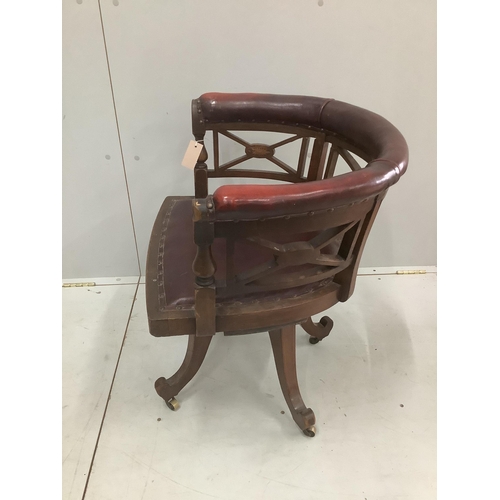 32 - An Edwardian inlaid mahogany leather swivel desk chair, width 65cm, depth 48cm, height 68cm. Conditi... 