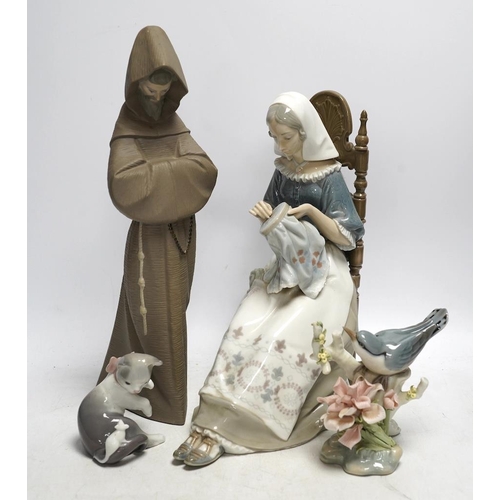 321 - Twelve various Lladro figures including birds and kittens, tallest 33cm. Condition - good