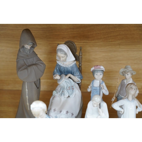 321 - Twelve various Lladro figures including birds and kittens, tallest 33cm. Condition - good