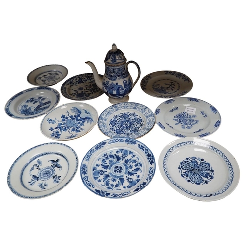 323 - Ten various blue and white dishes including Chinese and Delft and a Staffordshire blue and white cof... 