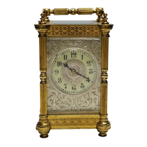 331 - A late 19th French pierced brass cased eight day carriage timepiece, with key, 17cm. Condition - sid... 