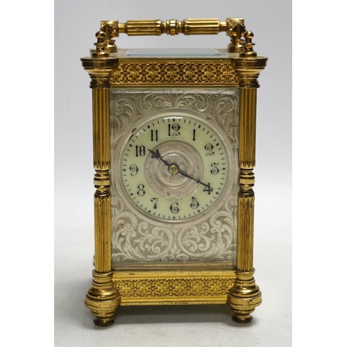 331 - A late 19th French pierced brass cased eight day carriage timepiece, with key, 17cm. Condition - sid... 