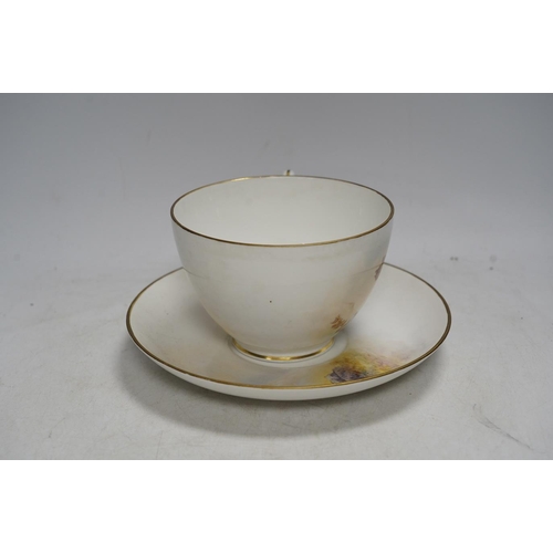 337 - A signed Worcester breakfast cup and saucer, L. Maybury and H. Sivad. Condition - good