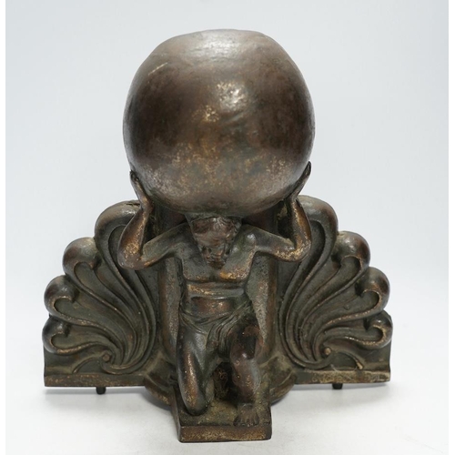 361 - A cast iron 'Atlas' fountain head, 27cm high. Condition - fair to good