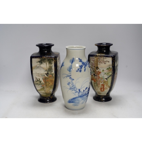 367 - A pair of Japanese satsuma pottery vases and a blue and white Meiji Arita vase, largest 24cm high. C... 