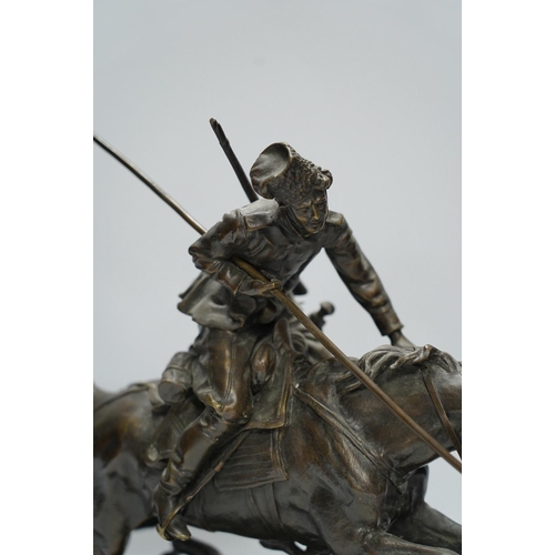 371 - After Eugene Lanceray (Russian, 1848-1886), bronze study of a Cossack charging, signed in cyrillic, ... 