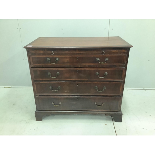 38 - A small George III mahogany chest of four drawers with brushing slide, width 94cm, depth 49cm, heigh... 