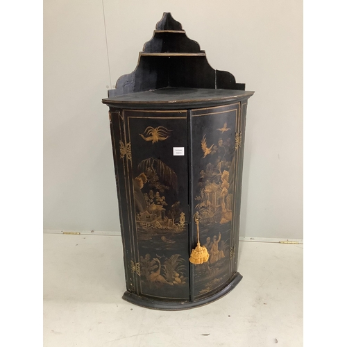 39 - An 18th century chinoiserie lacquer bowfront hanging corner cupboard, width 59cm, depth 40cm, height... 