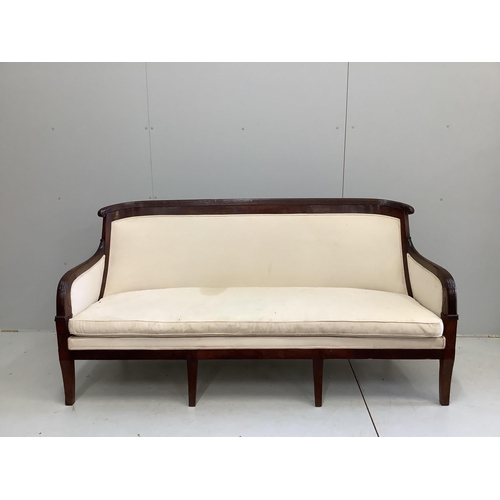 47 - A French Empire upholstered mahogany settee, width 176cm, depth 60cm, height 92cm and a similar faut... 