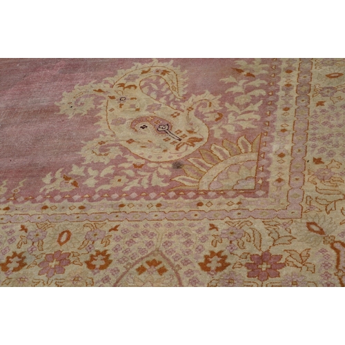 48 - An Amritsar carpet, approximately 580 x 395cm. Condition - poor