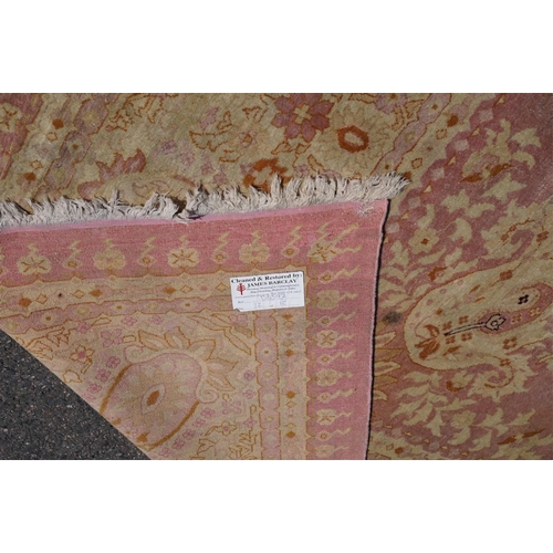 48 - An Amritsar carpet, approximately 580 x 395cm. Condition - poor