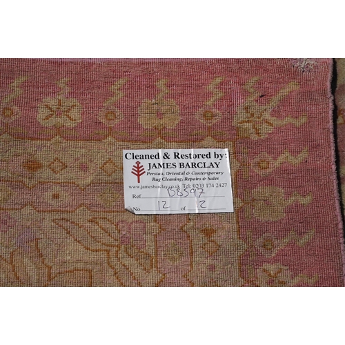 48 - An Amritsar carpet, approximately 580 x 395cm. Condition - poor