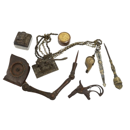 514 - Curios including a miniature percussion pistol, an Art Nouveau pill box and a silver mounted inkwell... 