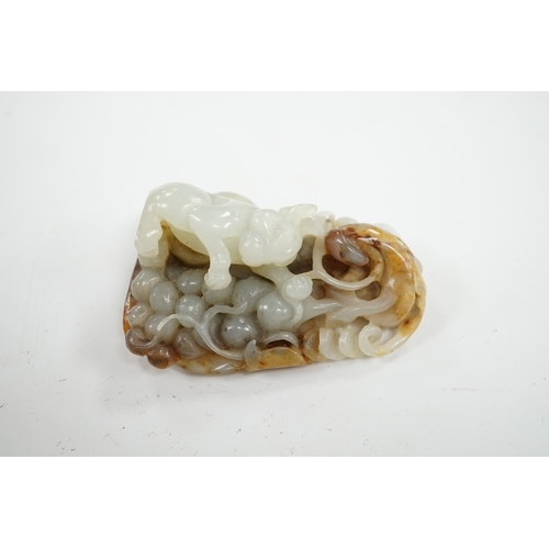 518 - A Chinese russet jade carving of an animal, 6cm high. Condition - good