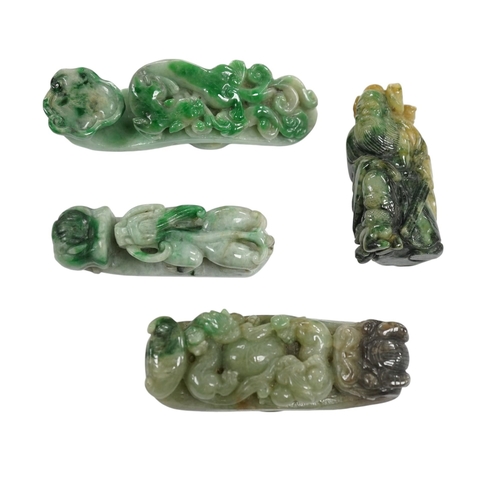 519 - Four Chinese green bowenite jade carvings and belt hooks, largest 9.5cm in length. Condition - good... 