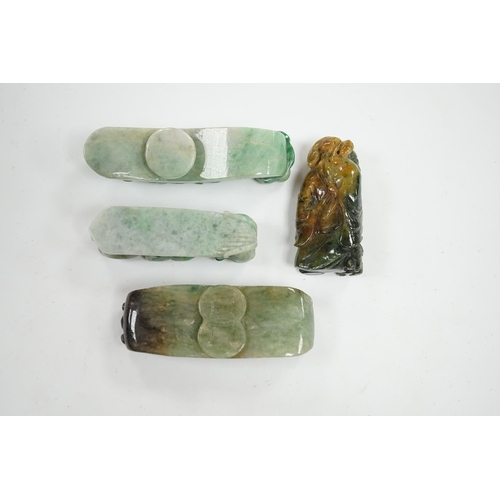 519 - Four Chinese green bowenite jade carvings and belt hooks, largest 9.5cm in length. Condition - good... 