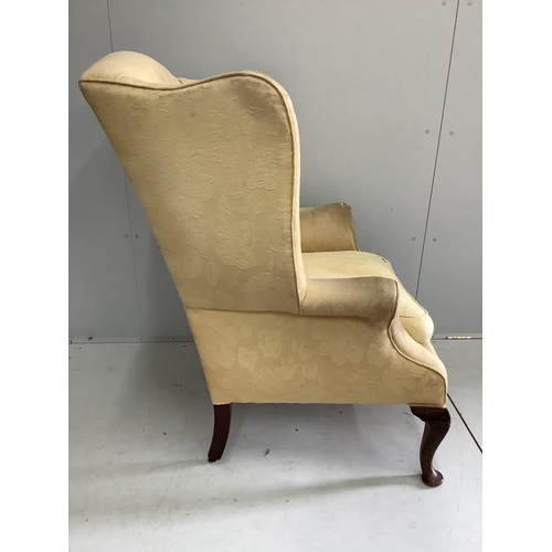 52 - A George III upholstered wing armchair, width 86cm, depth 74cm, height 105cm. Condition - poor to fa... 