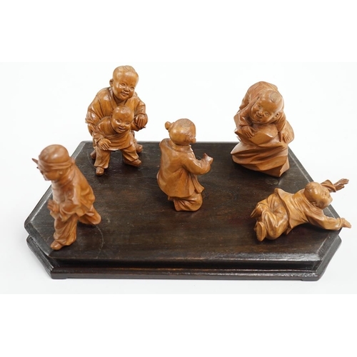 523 - A set five Chinese carved boxwood figures of children playing Blind mans Buff, Republic period, 23c... 