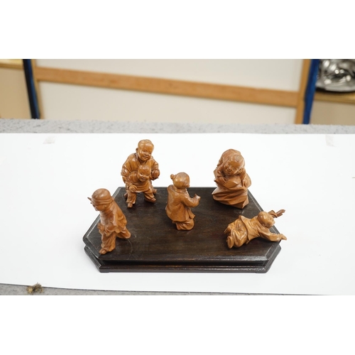 523 - A set five Chinese carved boxwood figures of children playing Blind mans Buff, Republic period, 23c... 