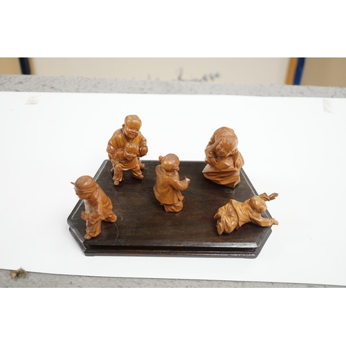 523 - A set five Chinese carved boxwood figures of children playing Blind mans Buff, Republic period, 23c... 