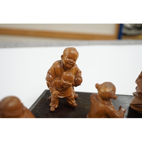 523 - A set five Chinese carved boxwood figures of children playing Blind mans Buff, Republic period, 23c... 