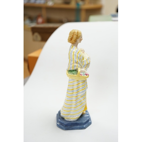 527 - A Royal Worcester figure,   'A Flower girl', modelled by Phoebe Stabler, 20.5cm high. Condition - go... 