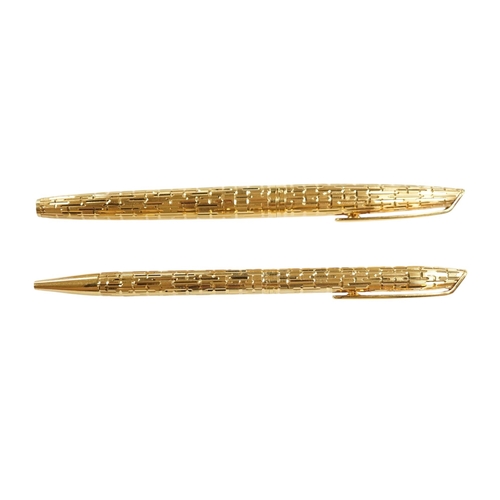 529 - A Watermans gold plated crocodile pattern fountain pen and ballpoint pen (2). Condition - good... 