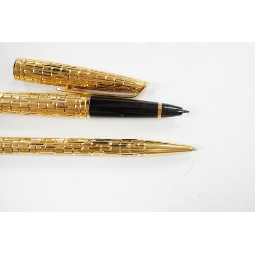 529 - A Watermans gold plated crocodile pattern fountain pen and ballpoint pen (2). Condition - good... 