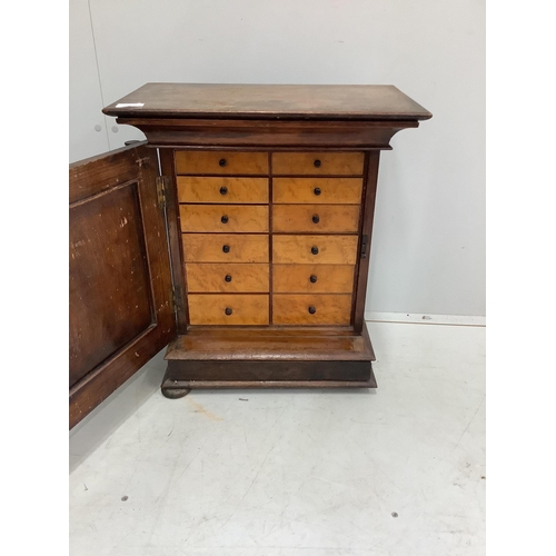 54 - A small Italian carved oak and walnut collector's chest, fitted ten bird's eye maple faced drawers, ... 