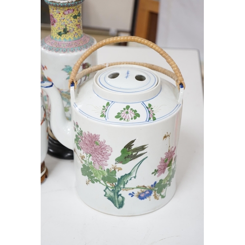 541 - Two early 20th century Chinese famille rose lamps and a large teapot. Condition - fair