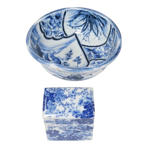 542 - A Japanese blue and white Arita stacking box and bowl, 32cm diameter. Condition - bowl good, box poo... 