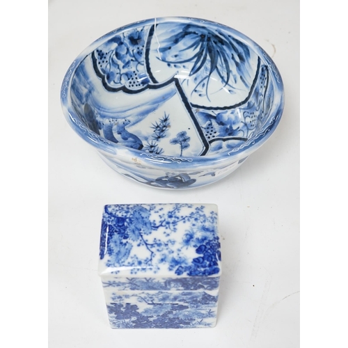 542 - A Japanese blue and white Arita stacking box and bowl, 32cm diameter. Condition - bowl good, box poo... 