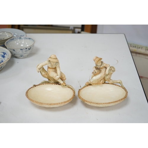 544 - A pair of Royal Worcester sweetmeat dishes modelled by James Hadley, impressed numbers 775 and 776, ... 