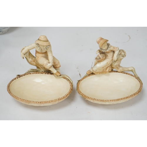 544 - A pair of Royal Worcester sweetmeat dishes modelled by James Hadley, impressed numbers 775 and 776, ... 