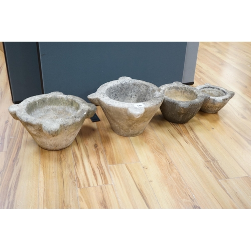 548 - Four graduated marble mortars, largest 46.5cm wide across top rim. Condition - largest mortar has a ... 