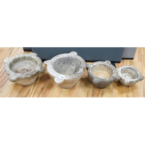 548 - Four graduated marble mortars, largest 46.5cm wide across top rim. Condition - largest mortar has a ... 