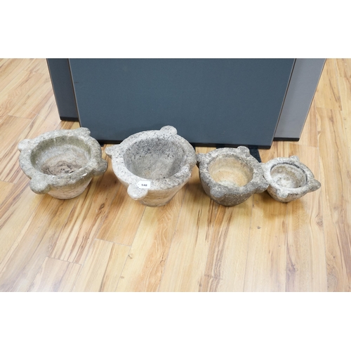 548 - Four graduated marble mortars, largest 46.5cm wide across top rim. Condition - largest mortar has a ... 