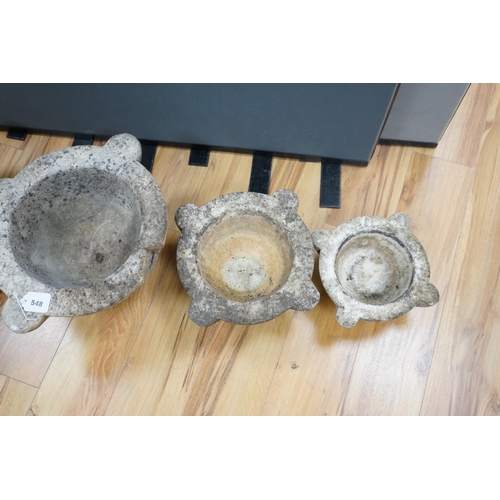 548 - Four graduated marble mortars, largest 46.5cm wide across top rim. Condition - largest mortar has a ... 