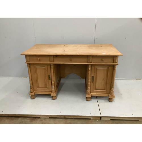 63 - A Continental stripped pine kneehole desk, width 154cm, depth 68cm, height 82cm. Condition - good... 