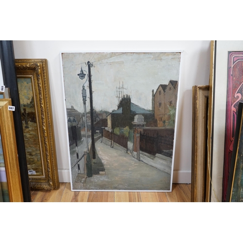 689 - J.A. Brewer (20th. C), oil on board, Northern street scene with gas lamp, signed, 80 x 60cm. Conditi... 