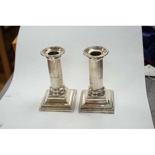 826 - A pair of Edwardian silver dwarf candlesticks, Thomas A. Scott, Sheffield, 1905, height 12.5cm, weig... 