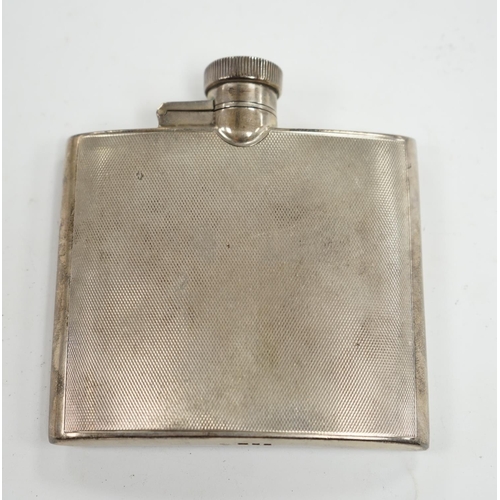 829 - A George VI engine turned silver hip flask, Goldsmiths & Silversmiths Co Ltd, London, 1937, 95mm. Co... 