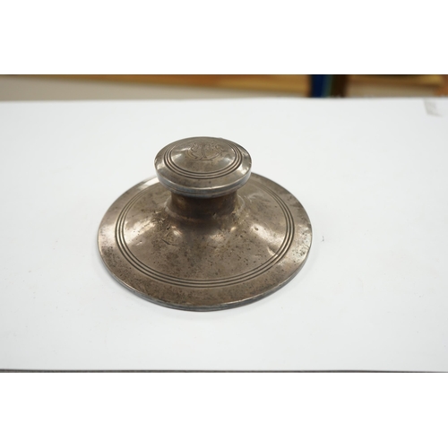 830 - A George V silver mounted capstan inkwell, Birmingham, 1910, base diameter 15.2cm. Condition - poor ... 